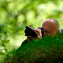 Detailní záběr na fotícího frekventanta